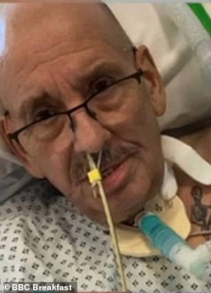 Mick was admitted to Nottingham City Hospital on April 4 and put into an induced coma five days later, and required long-term breathing assistance (pictured in hospital)