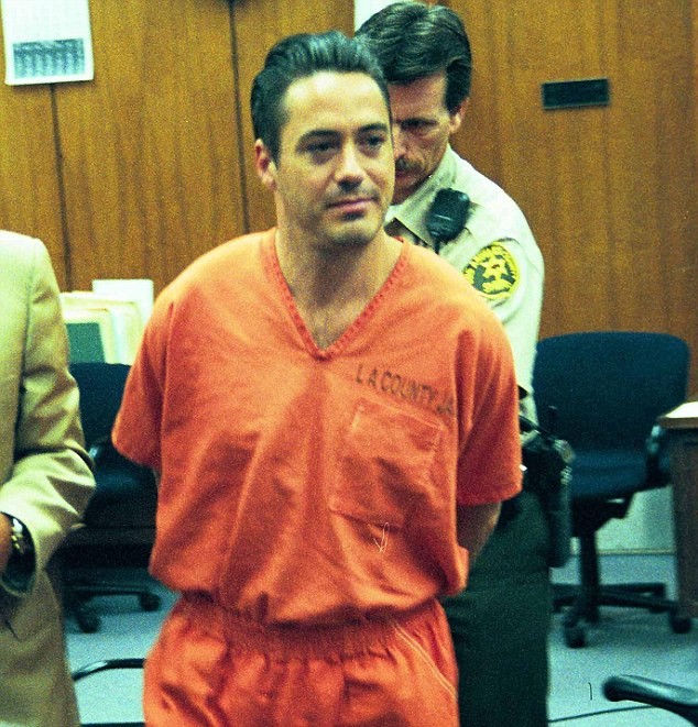 After being tipped for stardom, Robert Downey Jr spent the late 1990s and early 2000s addicted to drugs and reduced to earning eight cents an hour scrubbing pizza pans in the kitchen of the LA County jail during regular stints in prison (pictured in court in 1999)  