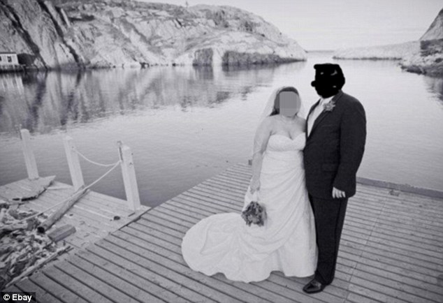 The seller also posted a picture from his wedding (pictured) on the site after requests from people on eBay. He covered the faces