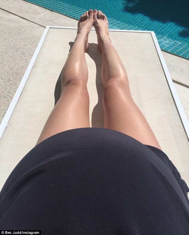 Looking swell! Just three days ago, Rebecca shared online a shot of her stomach as she relaxed by the pool, saying she was 