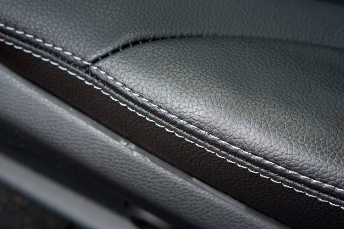 Up-close view of leather upholstery on a car seat