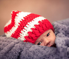 Новорожденный в шапке